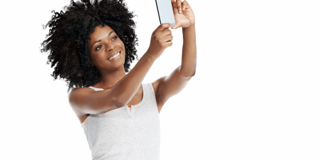 <strong>The ultimate selfie</strong> The reader is the reader’s favorite topic. So give the reader what she wants. <a href="https://www.shutterstock.com/image-photo/studio-shot-attractive-african-woman-afro-206178829" rel="noopener noreferrer" target="_blank"><em>Image by Daxiao Productions</em></a>