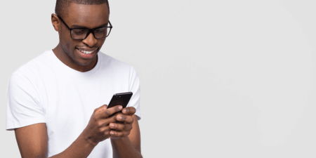 <strong>Nobody does it better</strong> Email remains the perfect complement to websites and social media, argues Jakob Nielsen. <em><a href="https://www.shutterstock.com/image-photo/smiling-black-young-man-glasses-holding-1296335626" target="_blank" rel="noopener noreferrer">Image by fizkes</a></em>